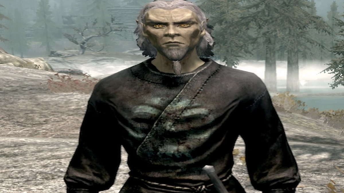 Dunmer in a black necromancer robe with a green skull on the front of it 