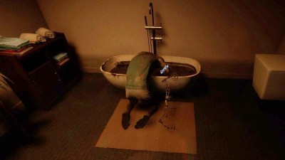 Compound Bow leaning against a bathtub in Sons of the Forest