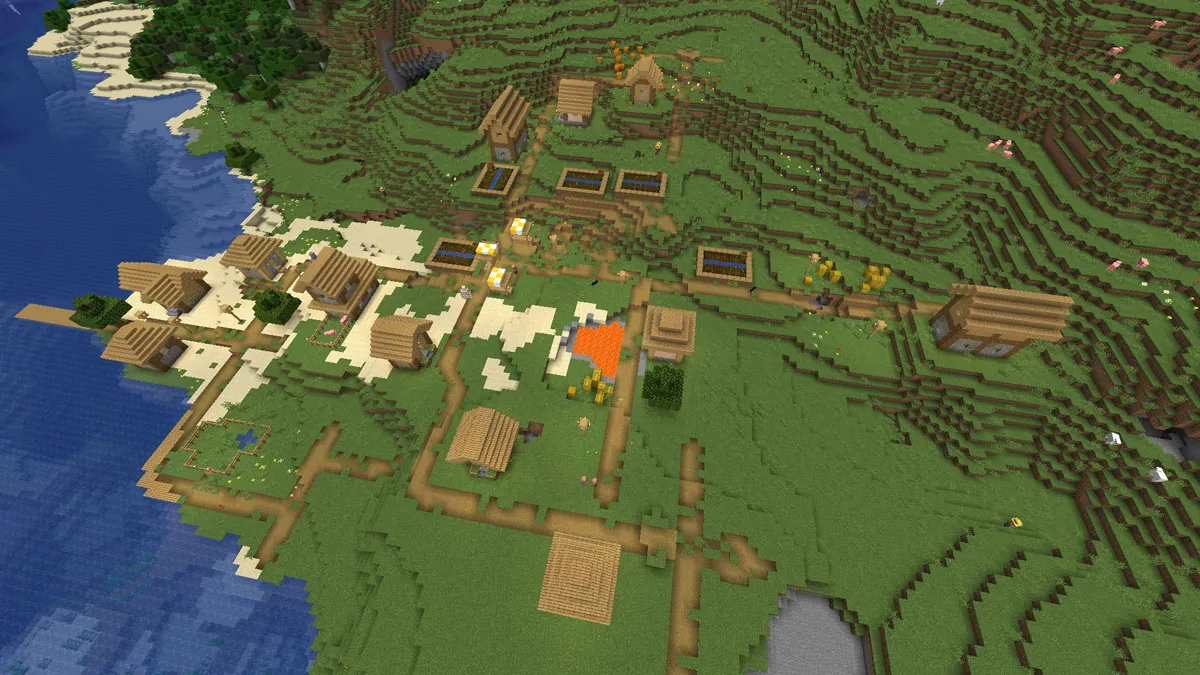An oceanside village with a lava pool in Minecraft