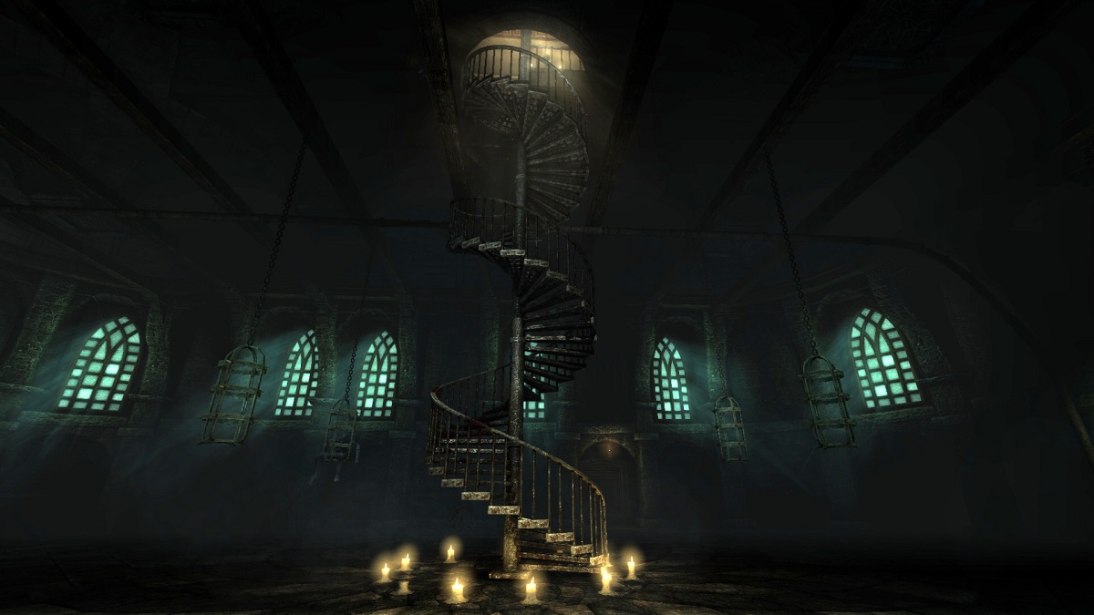 Spiral staircase at the center of a dark room