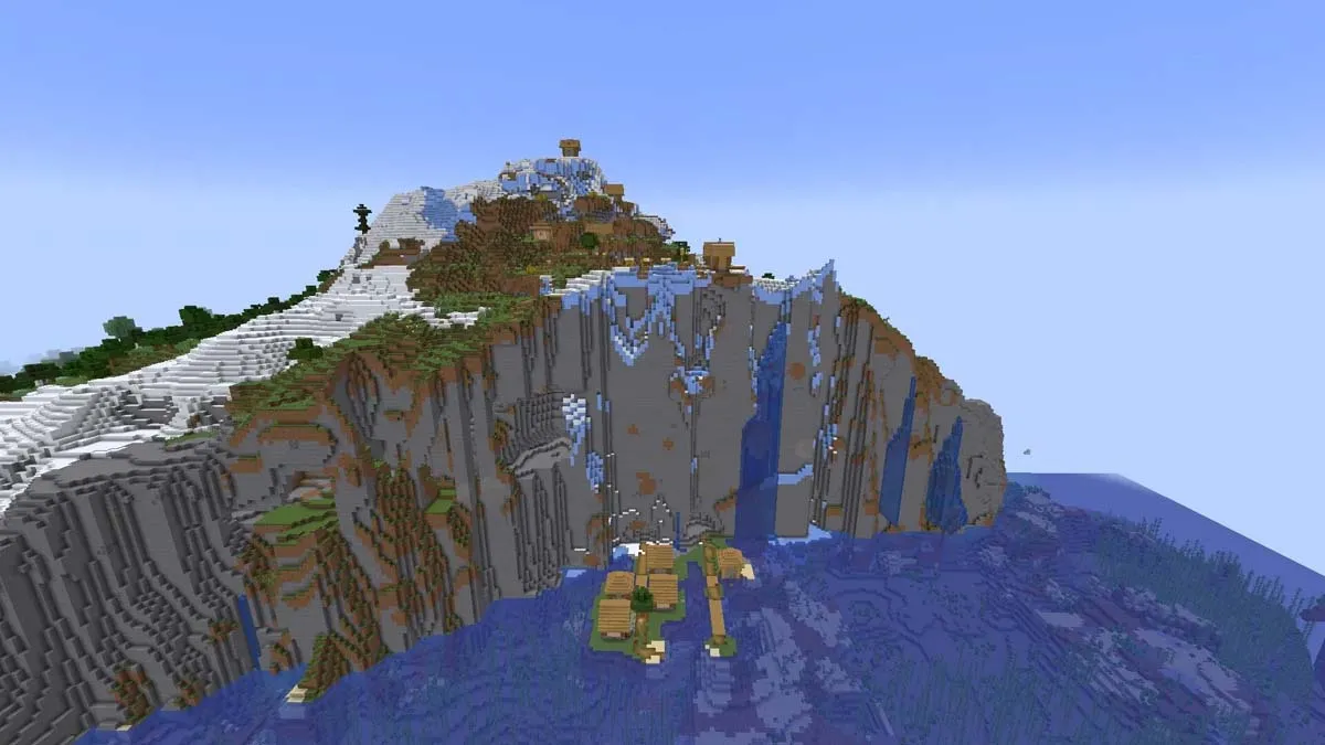 Cliffside village on some snowy slopes in Minecraft