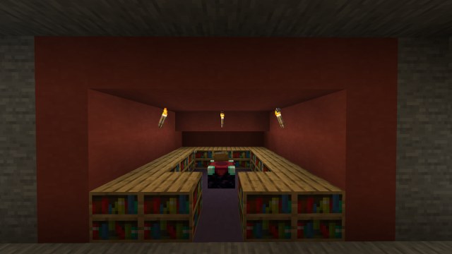 A room with an enchanting table in the middle, surrounded by bookshelves.