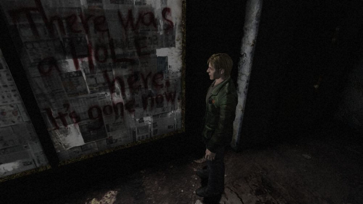 Promo Image for Silent Hill 2; showing James next to bloody writing on a wall.