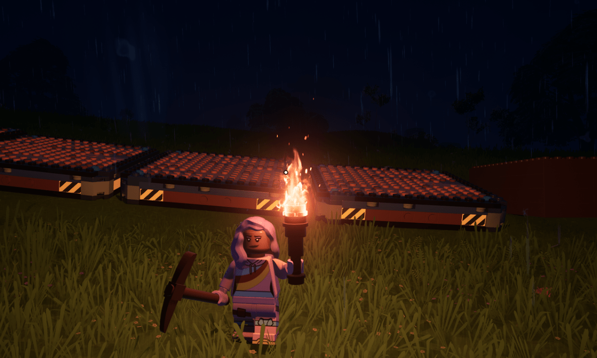 Minifigure holding a torch standing in front of dynamic foundations in LEGO Fortnite.