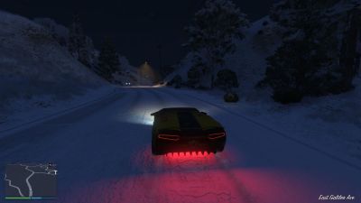 Driving the highway in the snow in GTA Online.