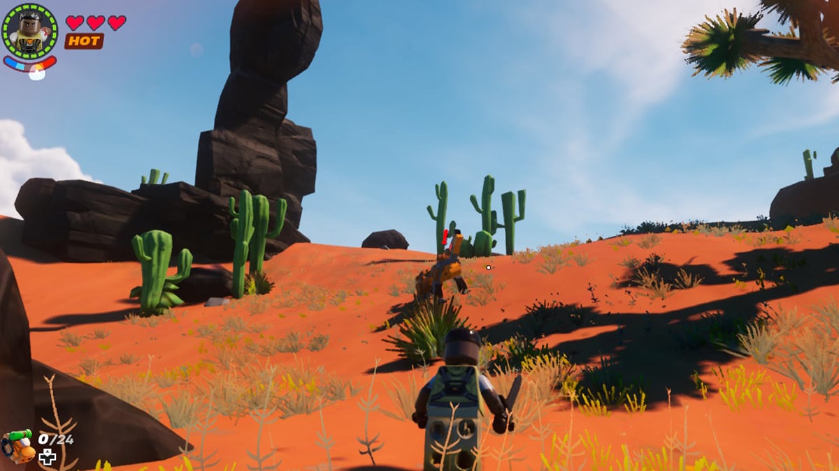 lego character suffering from heat in hot desert biome