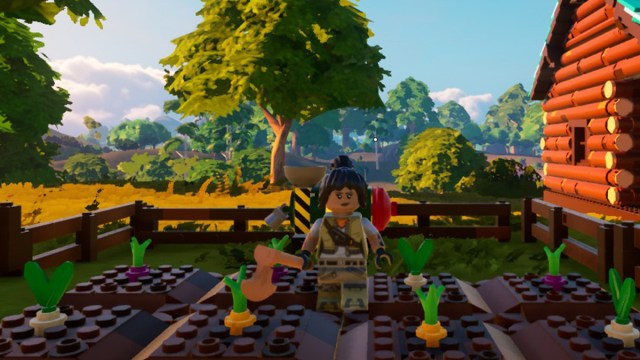 Lego character standing in crop field