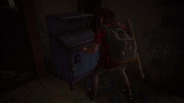 Ellie depositing items in a blue mailbox dead drop in TLoU2 No Return.