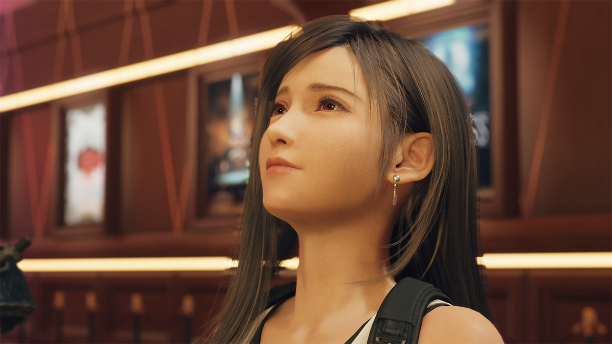 Tifa Lockhart with a longing smile on her face in Final Fantasy VII Rebirth