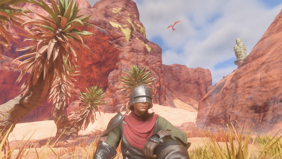 Character sitting on the dunes in the Kindlewastes.
