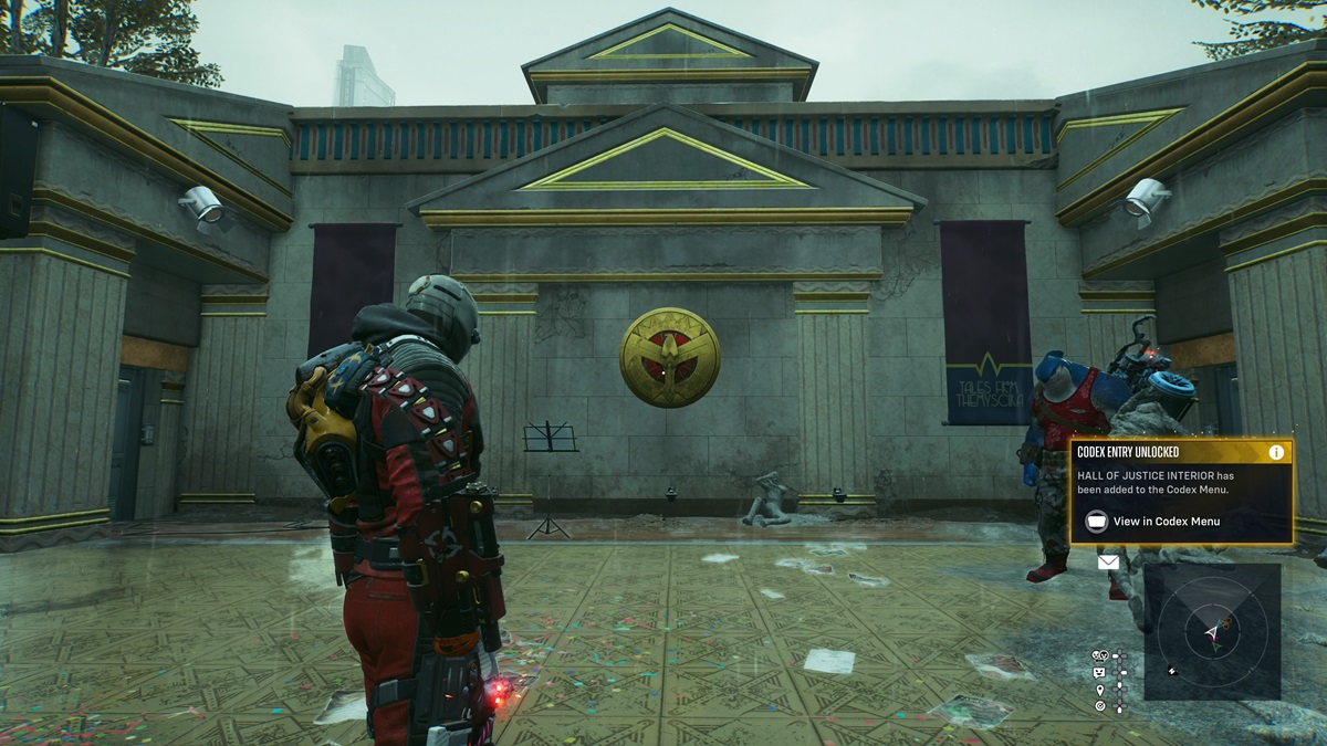 Deadshot standing in front of Wonder Woman's shield at a memorial.