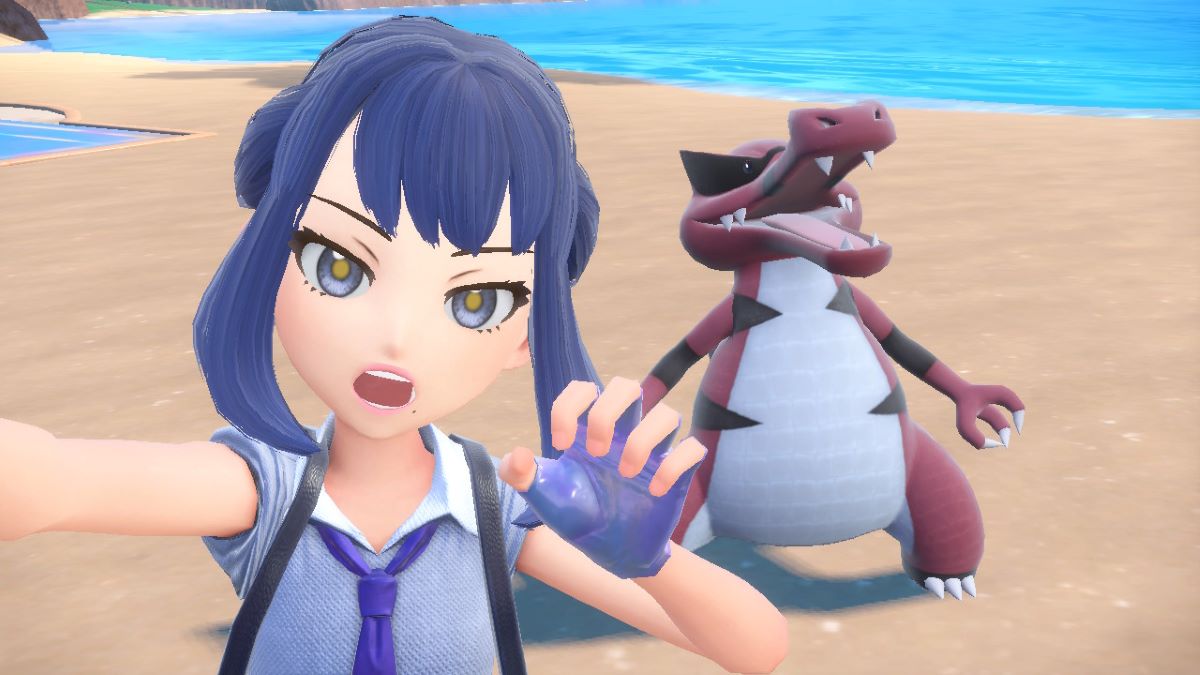 Player and Krookodile make a scary face in Pokemon Scarlet & Violet