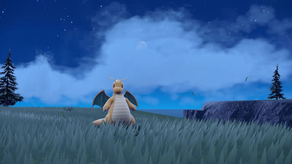 Dragonite in a field at night in Pokemon Scarlet & Violet