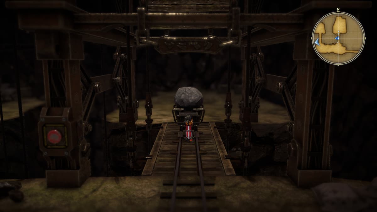 Nowa pulling cart with a rock in it onto the elevator track