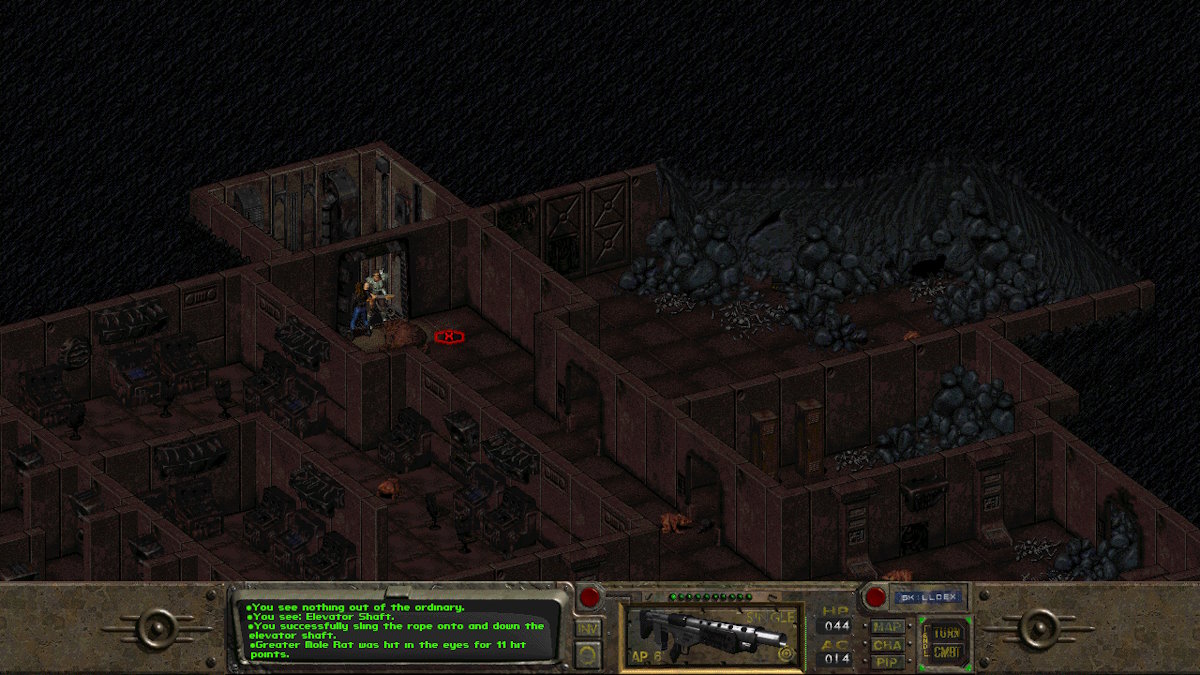 A dark cave from Fallout 1 seen from above in which the protagonist fights a giant gecko.
