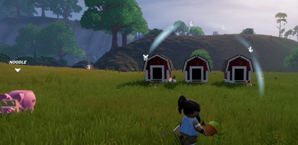 Player holding an Animal treat and three barns in the distance, chickens and a pig roaming