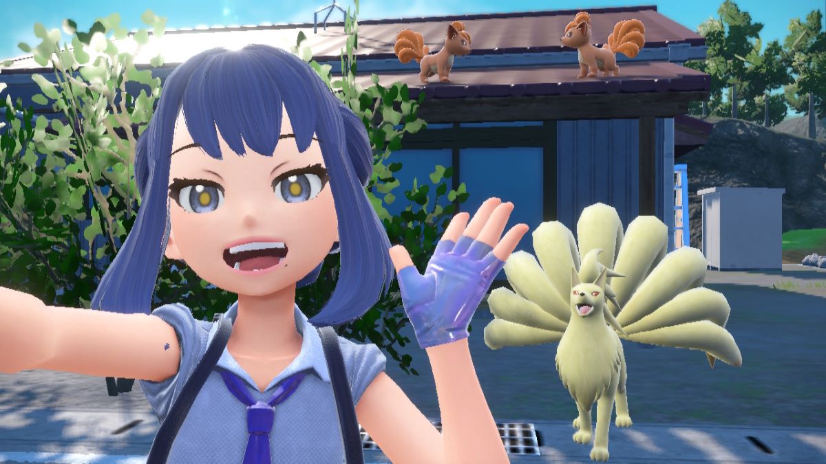 Player posing with Ninetales and Vulpix in Pokemon Scarlet & Violet