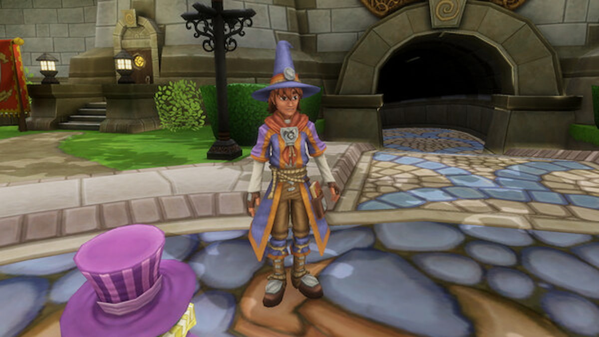 Student standing in Ravenwood wearing robes and wizard hat