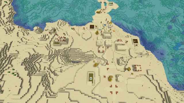 A Desert Village on a Coral Reef Coast next to a ravine with a mineshaft in Minecraft