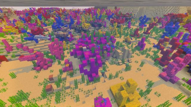 A large Warm Ocean Ruin Cluster in a Minecraft Coral Reef