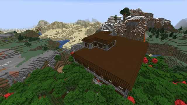 A Woodland Mansion surrounded by a Dark Forest and a Desert biome in Minecraft