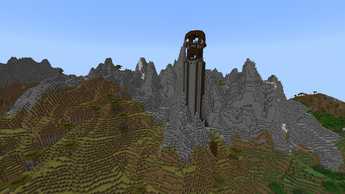 A tall Pillager Outpost in the middle of a set of Stony Peaks mountains in Minecraft
