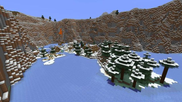 A Snowy Village on a frozen lake surrounded by tall cliffs in Minecraft