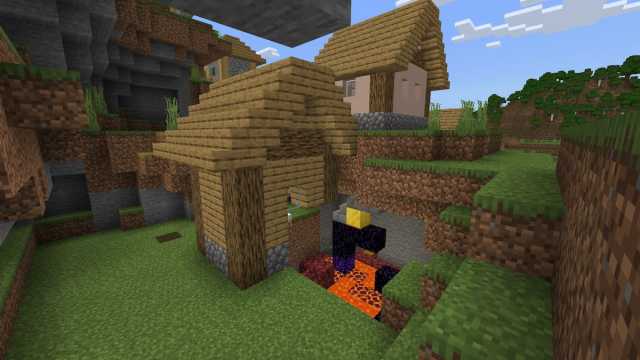 A Minecraft village home cut in half by a ruined Nether portal
