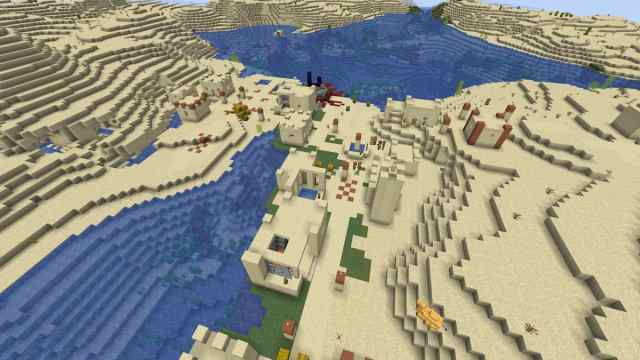 A Minecraft Desert Village with two Blacksmiths and a ruined Nether portal
