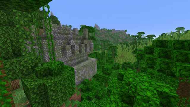 A Jungle Temple in front of a Bamboo Jungle biome in Minecraft