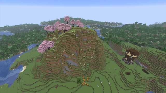 A Minecraft Cherry Grove biome on a really tall hill next to a Pillager Outpost