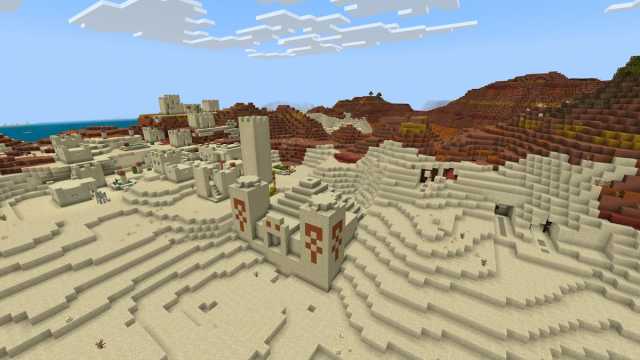 An exposed mineshaft on the surface of a Minecraft Desert biome next to a Desert Temple and a Desert Village