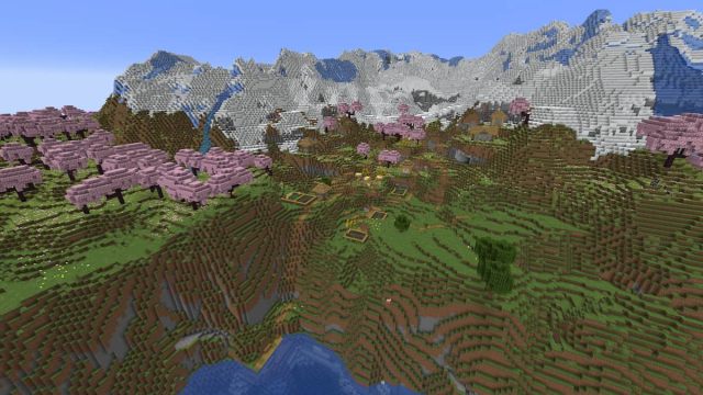 A Plains Village inside of a Cherry Grove on the side of a Snowy Slopes mountain in Minecraft