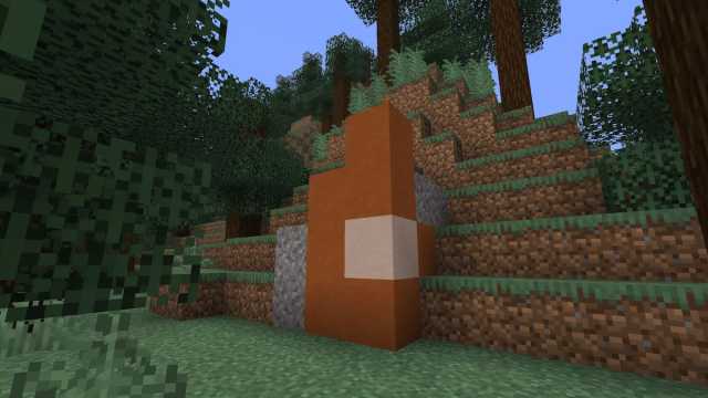 A set of red Trail Ruins in an Minecraft Old Growth Forest