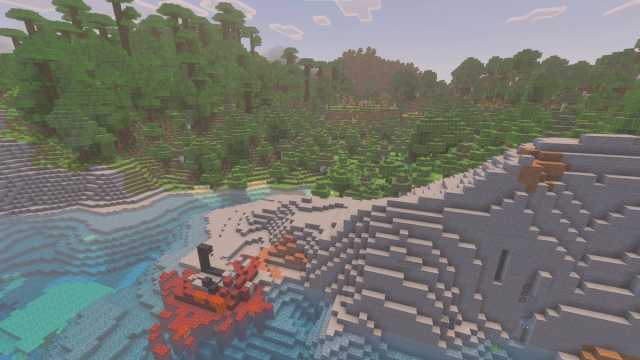 A Minecraft coastline with a visible ruined Nether portal and a Plains Village