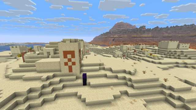 A Desert Temple and a buried ruined Nether portal in a Minecraft Desert Village