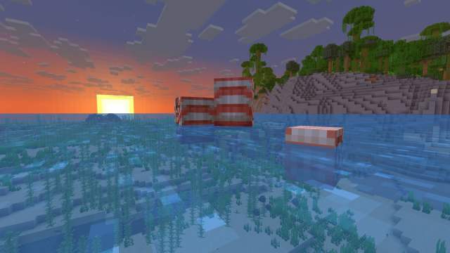Two parent Nautili with a baby Nautilus in Minecraft