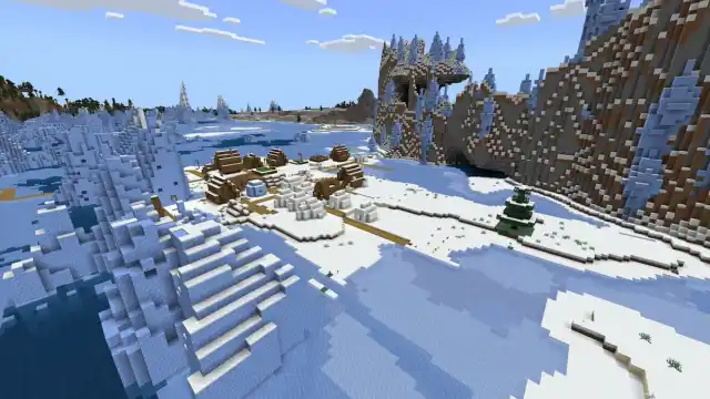 A small Snowy Village on a Frozen Ocean next to an Ice Spikes biome in Minecraft