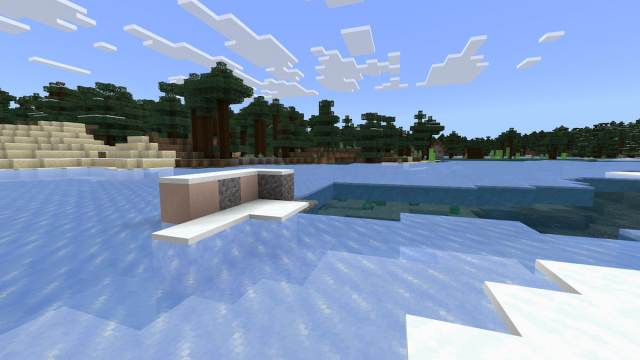 A set of Trail Ruins on a patch of ice with a Minecraft Taiga Village in the background