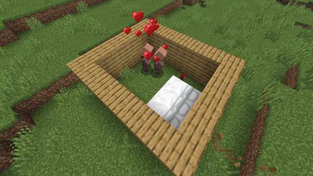 Breeding two Minecraft villagers with beetroot