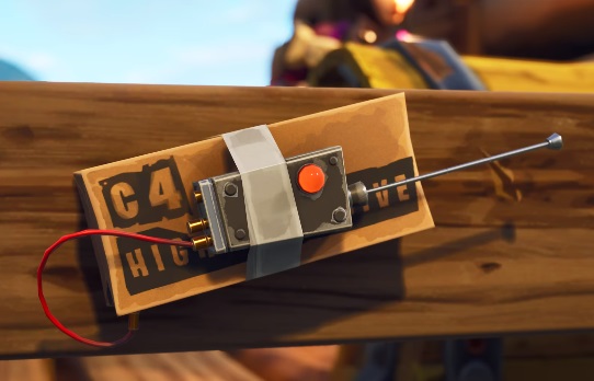 C4 attached to a board in Fortnite