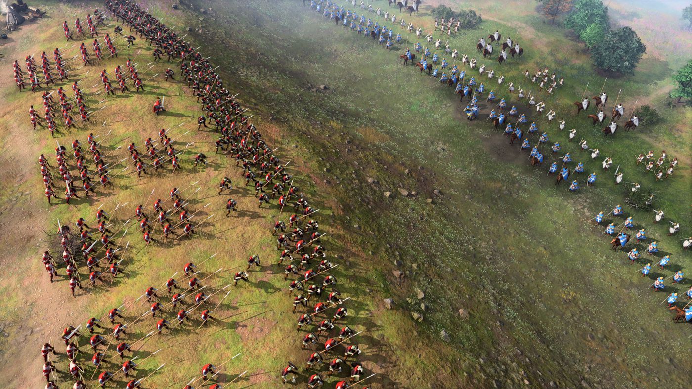 Two armies facing each other on mountainous terrain.