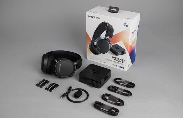 Arctis Pro Wireless with box, USB transmitter, and cables