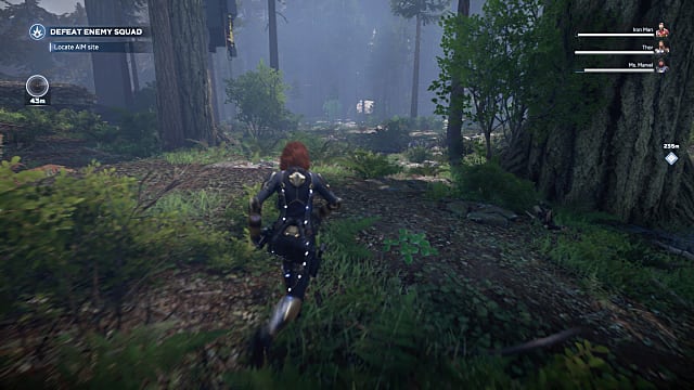 Black Widow running through the jungle, between two massive trees.
