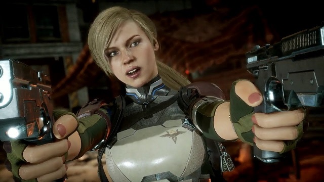 Cassie Cage holds two pistols
