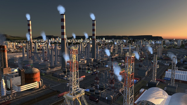 A vast expanse of oil fields with red and white conning towers emitting steam, reaches toward the city downtown
