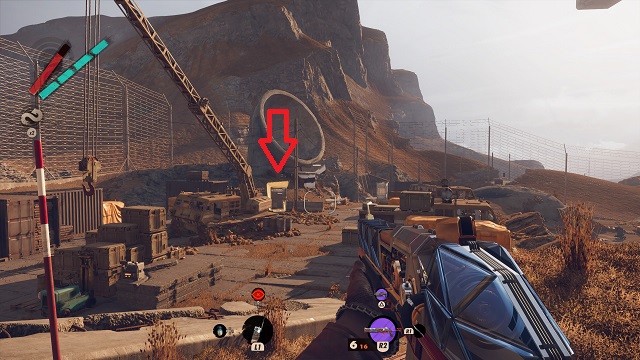 The player character holding a shotgun and looking out over a dusty construction yard with crane and other building materials.