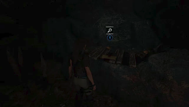 Lara finds the seventh document in a crypt on a raised rock shelf