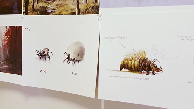 Concept images in an office show a tick and another insect in FO76