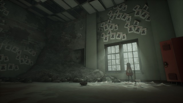 Sally looks out a window in a room covered in missing poster in GYLT. 